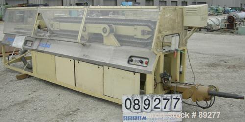 Used Actual Puller/Cutter, Model ARZ3000. (2) 9" wide x 96" long contact area, pneumatically adjustable cleated rubber belts, approximate 6" daylight. Driven by an approximate 5 hp motor. (1) Upactin...