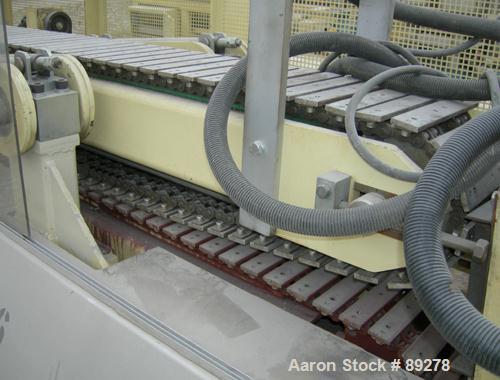 Used Actual Puller/Cutter, Model ARZ3000. (2) 9" wide x 96" long contact area, pneumatically adjustable belts, approximate 6" daylight. Driven by an approximate 5 hp motor. (1) Upacting traveling saw...