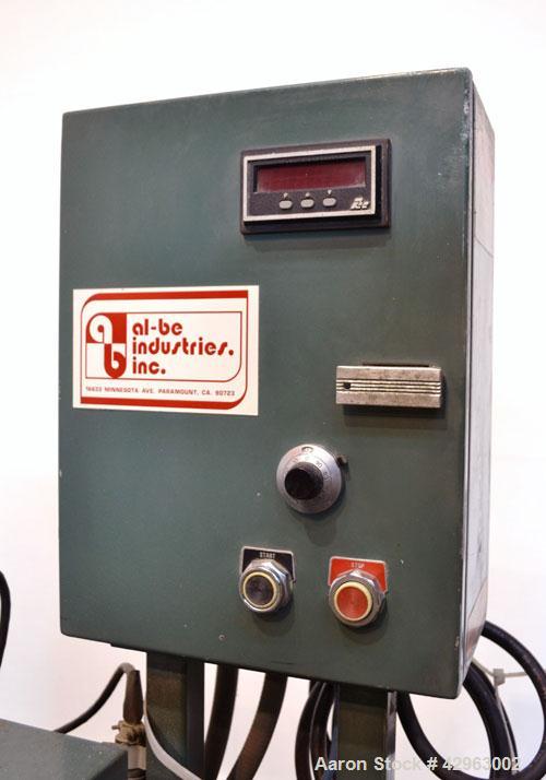 Used Al-Be Industries Puller, Model PV400AC. (2) 3-1/2’’ Wide x 32’’ long contact  rubber belts. 0’’ to 4’’ Capacity opening, manually adjustable. Driven by a 2hp, 3/60/230/460 volt , 1725 rpm gear m...