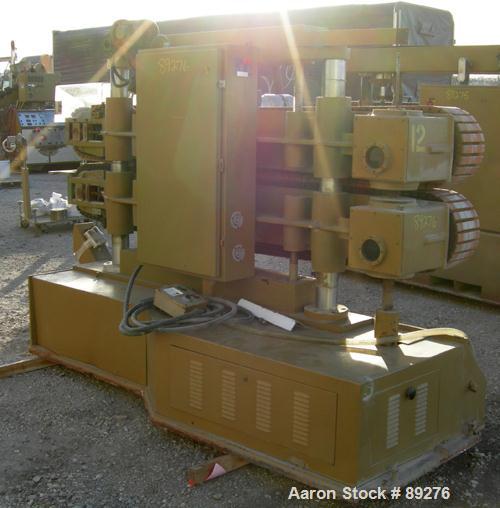 Used Becz Machine Belt Puller, Model 051. (2) 8" wide x 8' long contact area. Top belt motorized adjustment, bottom belt manually adjustable. Driven by an approximate 5 hp motor. Includes control pan...