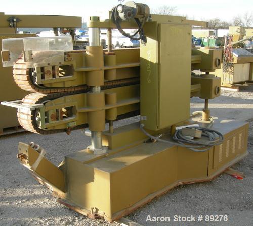 Used Becz Machine Belt Puller, Model 051. (2) 8" wide x 8' long contact area. Top belt motorized adjustment, bottom belt manually adjustable. Driven by an approximate 5 hp motor. Includes control pan...