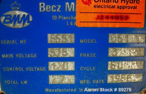Used Becz Machine Belt Puller, Model 051. (2) 8" wide x 8' long contact area. Top belt motorized adjustment, bottom belt manually adjustable. Driven by an approximate 5 hp motor. Includes control pan...