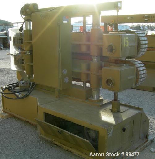 USED: Becz Machine belt puller, model 051. (2) 8" wide x 8' long contact area. Top belt motorized adjustment, bottom belt manually adjustable. Driven by an approximate 5 hp motor. Includes control pa...