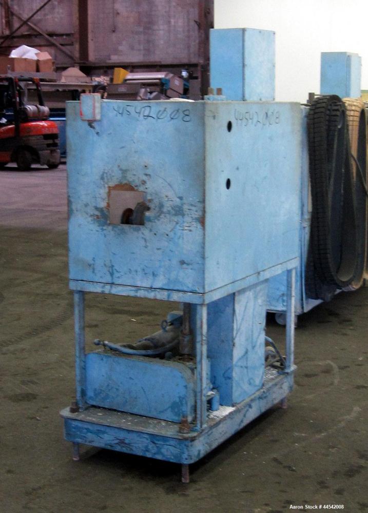 Used Boston Matthews Belt Puller, Model C-650-VT. (2) Approximately 4" wide x 24" long contact area belts, manually adjustable. Driven by a 1.5 hp, 180 volt, 1750 rpm motor. Includes a Contrex M-Driv...