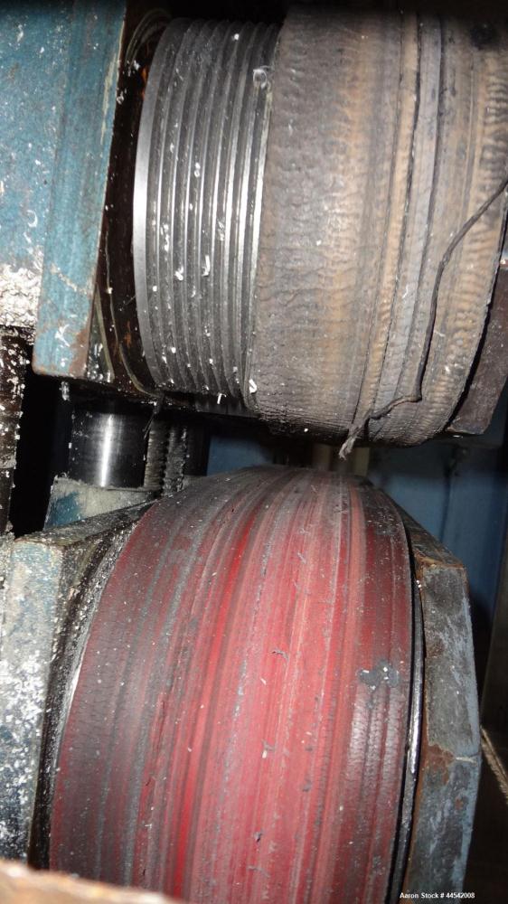 Used Boston Matthews Belt Puller, Model C-650-VT. (2) Approximately 4" wide x 24" long contact area belts, manually adjustable. Driven by a 1.5 hp, 180 volt, 1750 rpm motor. Includes a Contrex M-Driv...