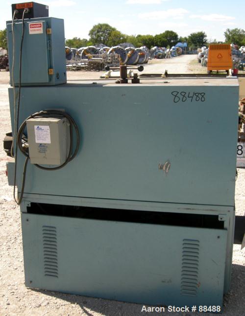 USED: Boston Matthews belt puller, model CL650-UT. (2) Manually adjustable belts, 4-1/2" wide x 42" long contact area. Driven by a 3 hp, 180 volt, 1750 rpm DC motor with reducer. Approximately 1-143 ...