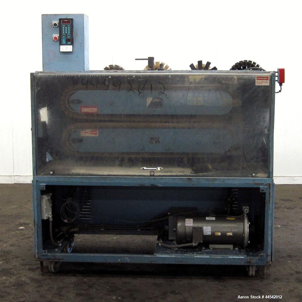 Used Boston Matthews Cleated Belt Puller, Model CWL-600-VT. (2) Approximately 4” wide x 42” long contact area belts, manually adjustable, take off speed range 1 to 60 feet per minute. Driven by a 3 h...