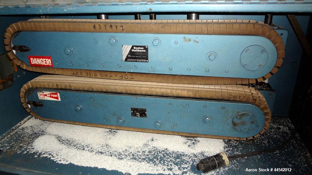 Used Boston Matthews Cleated Belt Puller, Model CWL-600-VT. (2) Approximately 4” wide x 42” long contact area belts, manually adjustable, take off speed range 1 to 60 feet per minute. Driven by a 3 h...