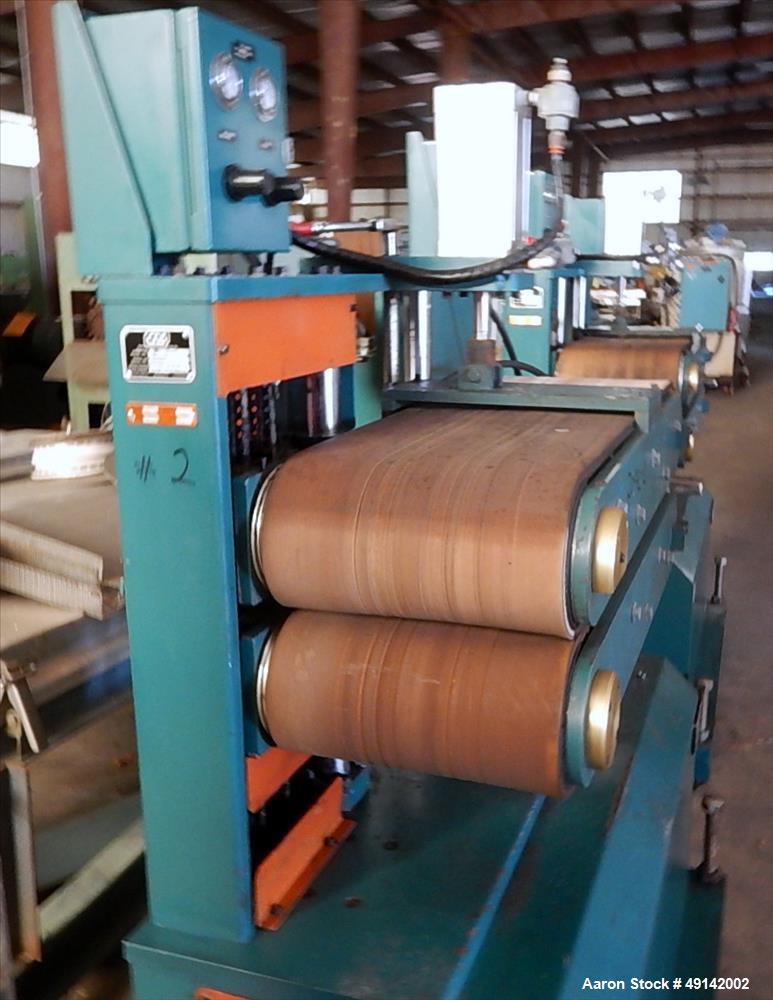 Used Customs Downstream Systems Belt Puller, Model CCH 36-14.