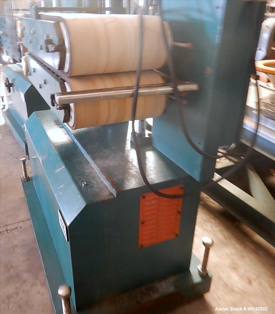 Used Customs Downstream Systems Belt Puller, Model CCH 36-14.