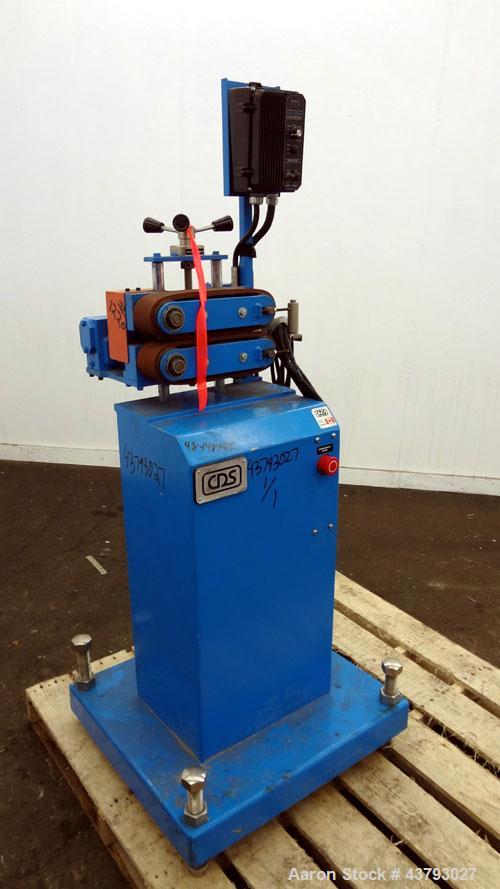Used Custom Downstream Systems Belt Puller, Model CBH 9.5-3. Right to left operation. (2) 2-3/4" wide x approximate 9-1/2" long contact area rubber belts. Approximately 2 to 30 feet per minute belt s...