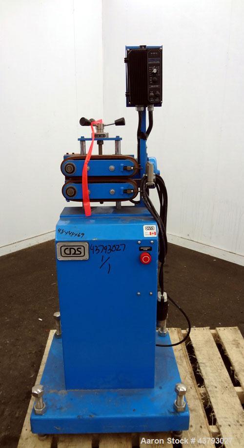 Used Custom Downstream Systems Belt Puller, Model CBH 9.5-3. Right to left operation. (2) 2-3/4" wide x approximate 9-1/2" long contact area rubber belts. Approximately 2 to 30 feet per minute belt s...