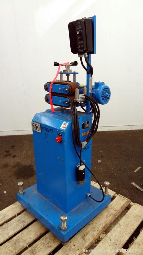Used Custom Downstream Systems Belt Puller, Model CBH 9.5-3. Right to left operation. (2) 2-3/4" wide x approximate 9-1/2" long contact area rubber belts. Approximately 2 to 30 feet per minute belt s...