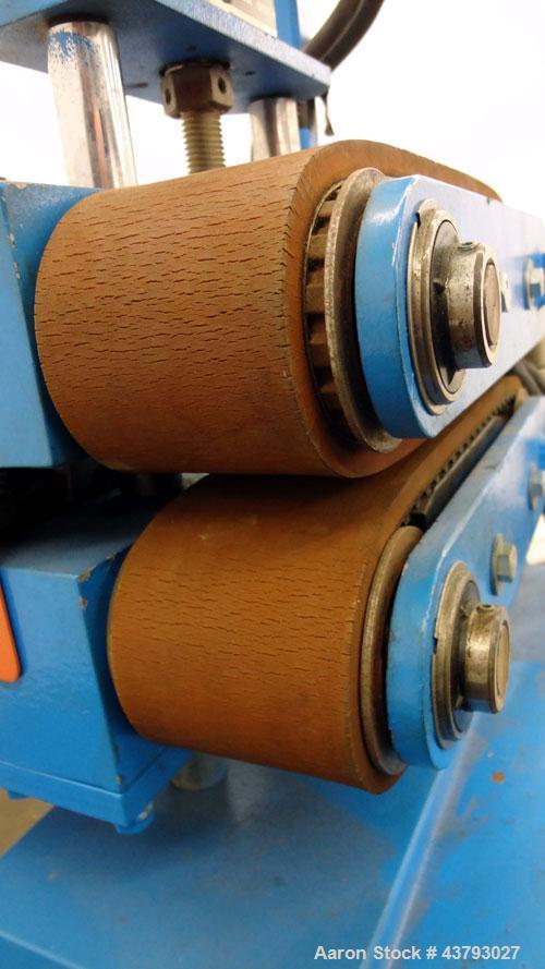 Used Custom Downstream Systems Belt Puller, Model CBH 9.5-3. Right to left operation. (2) 2-3/4" wide x approximate 9-1/2" long contact area rubber belts. Approximately 2 to 30 feet per minute belt s...
