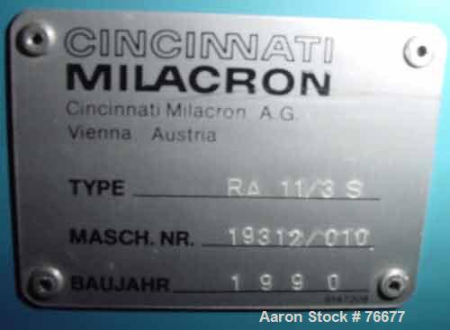USED: Cincinnati Milicron profile pipe puller, model RA11/3S. 7" x 15"openings. (3) 3/8" wide x 65" contact length cleated belts,pneumatically/manually adjustable. Driven by a 4.2 kw, 380 volt motor....