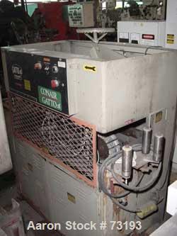 USED: Conair/Gatto cleated belt puller, model #207-3PC. 3" wide x 36" long contact length. 2 hp Fincor DC SCR motor, voltage 1/60/480V, 7.5 amps, 3 kva. Hand wheel gap adjustment. Manufactured 1990.