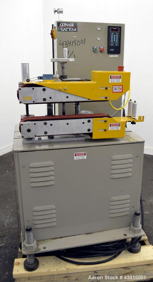 Used Conair Jetro Gatto Puller, Model 3-20. (2) 3” Wide x 20" long contact area. Manually adjustable rubber belts. Maximum feed opening 4” high. Driven by a 1.5 hp, 180 volt, 1750 rpm DC motor with r...