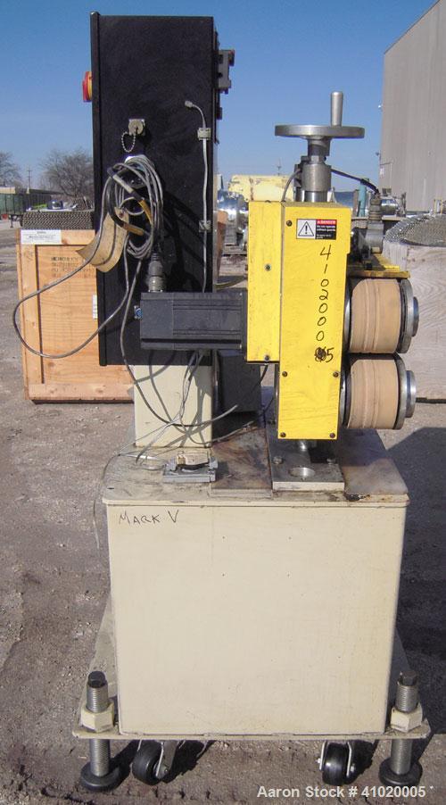 Used Conair Belt Puller, Model 4-26. (2) manually adjustable rubber belts, 3 3/4" wide x 30" long. Driven by a 2.46 hp, 3/60/240 volt, 3000 rpm motor. Mounts on casters.





