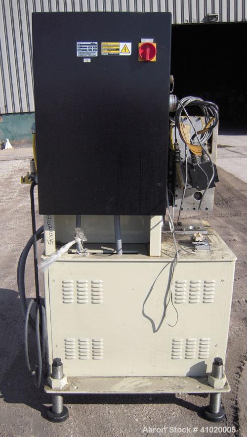 Used Conair Belt Puller, Model 4-26. (2) manually adjustable rubber belts, 3 3/4" wide x 30" long. Driven by a 2.46 hp, 3/60/240 volt, 3000 rpm motor. Mounts on casters.





