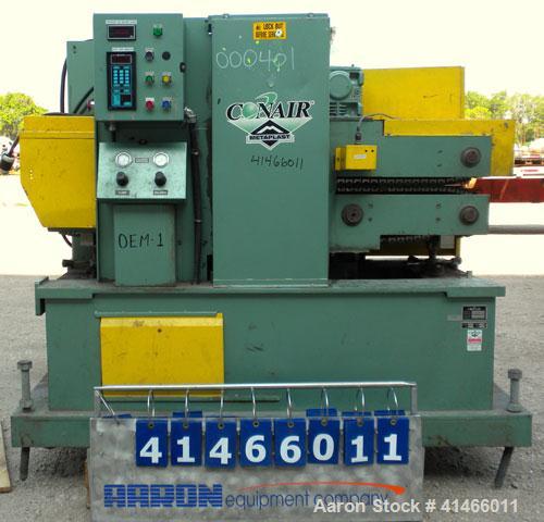 Used Conair Metaplast Puller, Model PC12-60SP-L. (2) 11-3/4" wide x 60" long contact area. Adjustable cleated belts. Rated low speed 1 feet per minute to 10 feet per minute. Each belt driven by a 2 h...