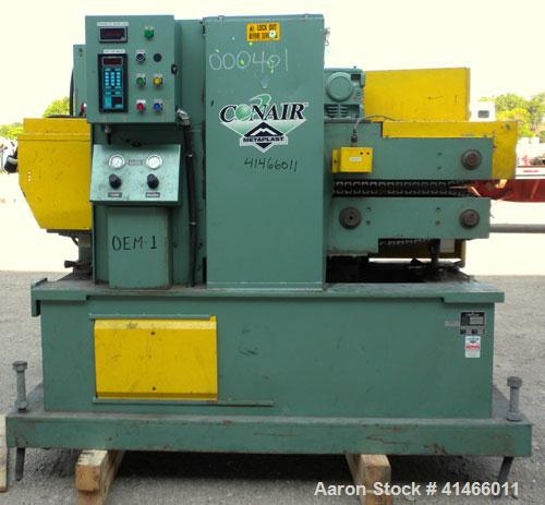 Used Conair Metaplast Puller, Model PC12-60SP-L. (2) 11-3/4" wide x 60" long contact area. Adjustable cleated belts. Rated low speed 1 feet per minute to 10 feet per minute. Each belt driven by a 2 h...