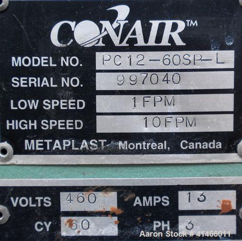 Used Conair Metaplast Puller, Model PC12-60SP-L. (2) 11-3/4" wide x 60" long contact area. Adjustable cleated belts. Rated low speed 1 feet per minute to 10 feet per minute. Each belt driven by a 2 h...