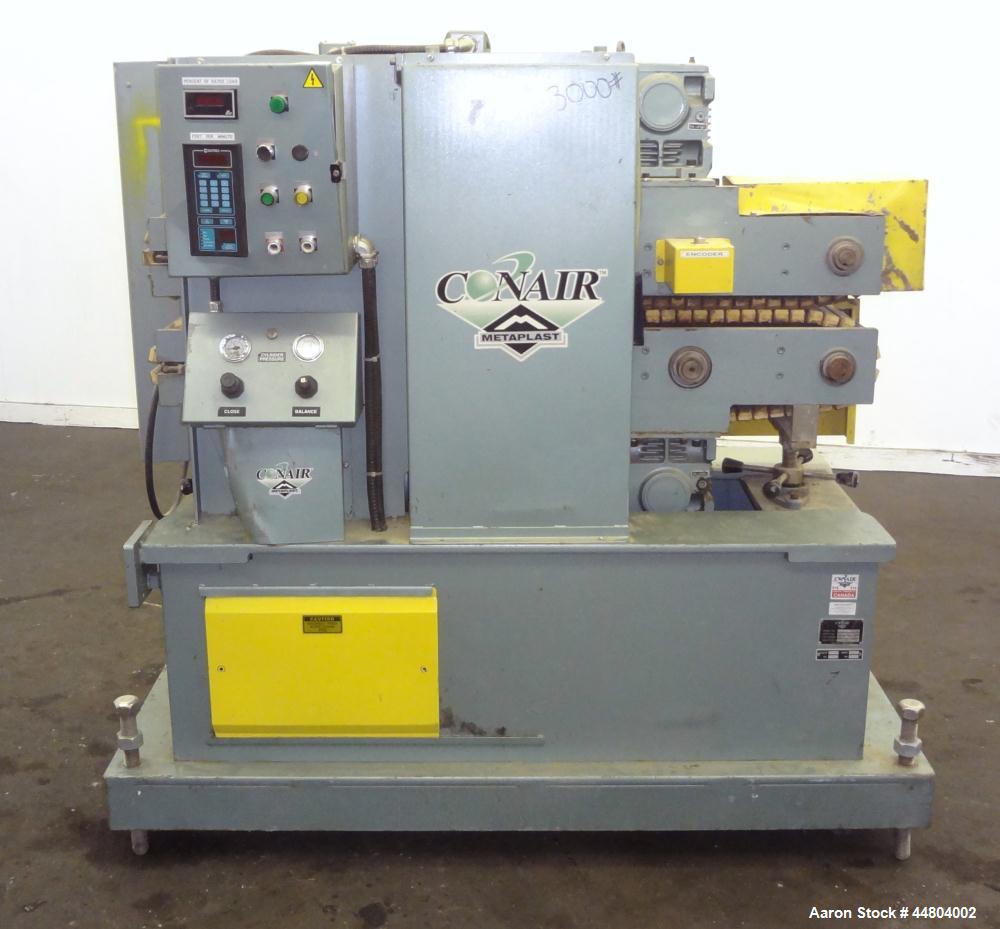 Used Conair Cleated Belt Puller, Model PC8-50-L.  7-1/2" Wide x 50" long contact surfaces.  Rated 1-10 feet per minute. Independently driven belts with 2 hp, 230/460 volt motors on stand with control...