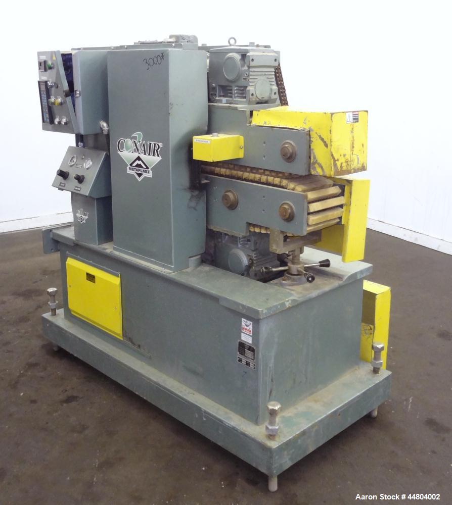 Used Conair Cleated Belt Puller, Model PC8-50-L.  7-1/2" Wide x 50" long contact surfaces.  Rated 1-10 feet per minute. Independently driven belts with 2 hp, 230/460 volt motors on stand with control...