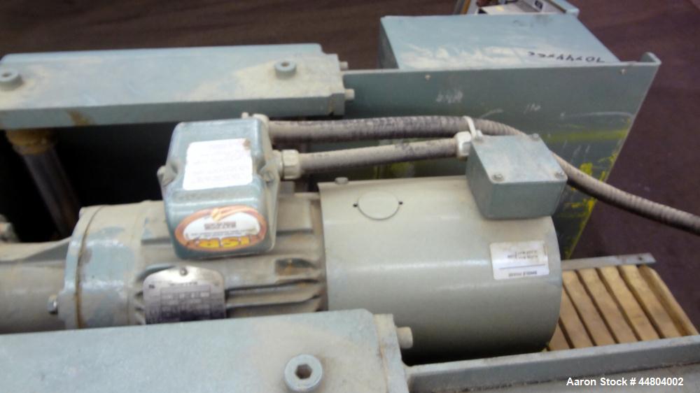 Used Conair Cleated Belt Puller, Model PC8-50-L.  7-1/2" Wide x 50" long contact surfaces.  Rated 1-10 feet per minute. Independently driven belts with 2 hp, 230/460 volt motors on stand with control...