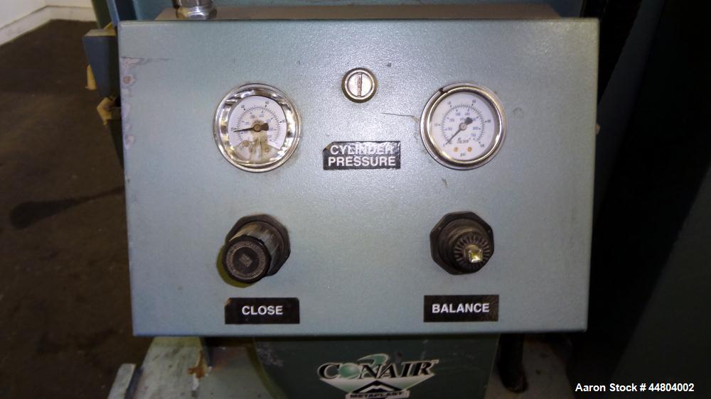 Used Conair Cleated Belt Puller, Model PC8-50-L.  7-1/2" Wide x 50" long contact surfaces.  Rated 1-10 feet per minute. Independently driven belts with 2 hp, 230/460 volt motors on stand with control...
