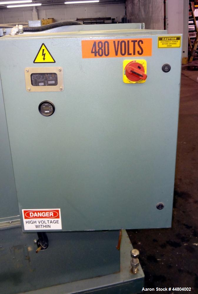 Used Conair Cleated Belt Puller, Model PC8-50-L.  7-1/2" Wide x 50" long contact surfaces.  Rated 1-10 feet per minute. Independently driven belts with 2 hp, 230/460 volt motors on stand with control...