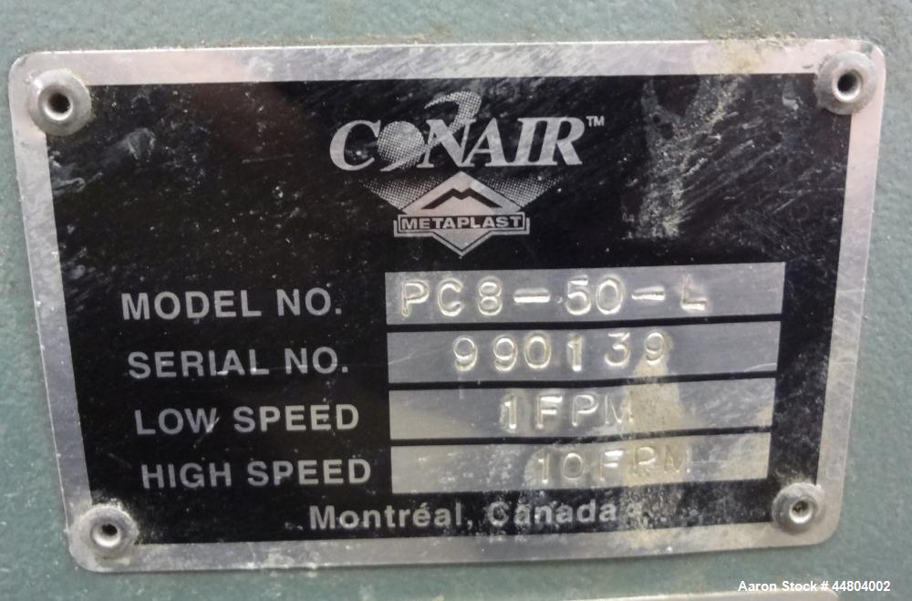 Used Conair Cleated Belt Puller, Model PC8-50-L.  7-1/2" Wide x 50" long contact surfaces.  Rated 1-10 feet per minute. Independently driven belts with 2 hp, 230/460 volt motors on stand with control...