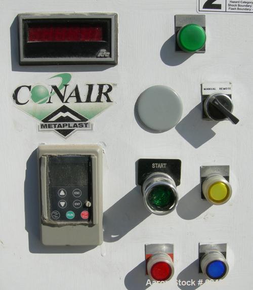 USED: Conair puller, model PC8-50. (2) 7-3/4" wide x 50" long contact areas. Adjustable cleated belts. Each belt driven by a 2 hp, 3/60/230/460 volt, 1750 rpm gearmotor. Low speed 4 fpm, high speed 4...
