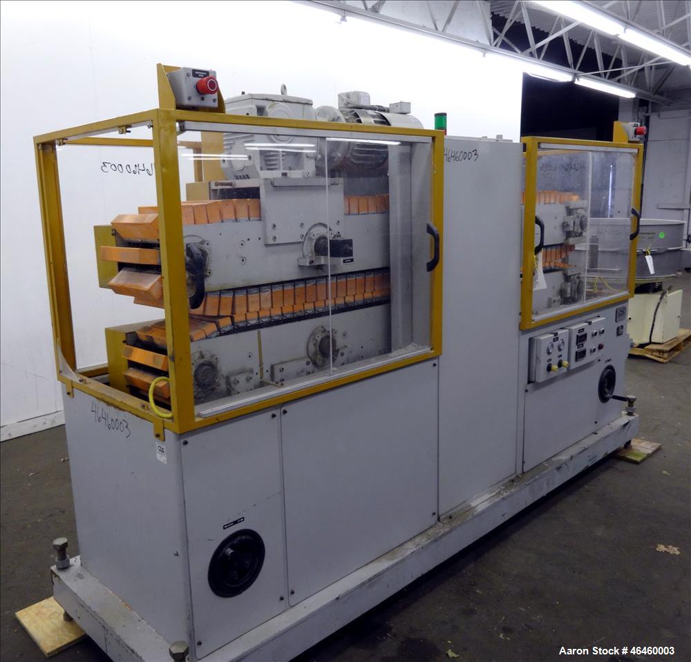 Used Custom Downstream Systems Cleated Puller, Model CCH 96-10Q. (2) 10" Wide x 96" long contact area cleated belts. Approximate 1 to 20 feet per minute. Each belt driven by 3 hp, 3/60/230/460 volt, ...