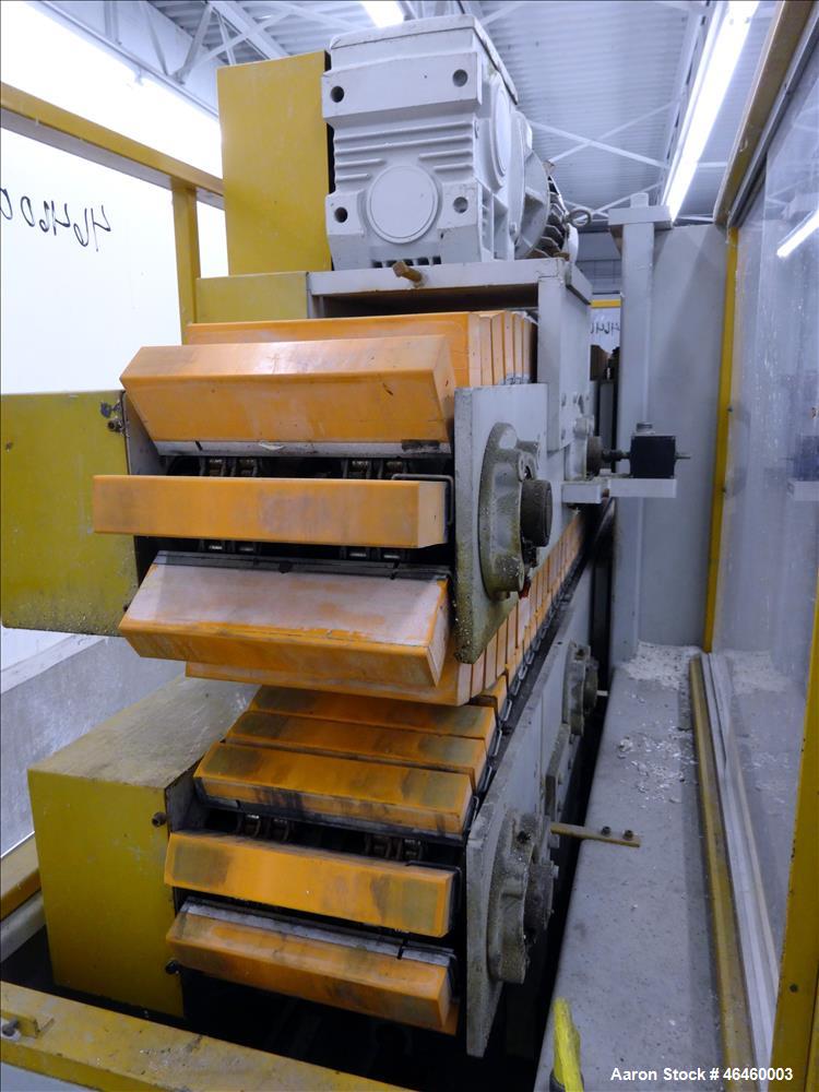 Used Custom Downstream Systems Cleated Puller, Model CCH 96-10Q. (2) 10" Wide x 96" long contact area cleated belts. Approximate 1 to 20 feet per minute. Each belt driven by 3 hp, 3/60/230/460 volt, ...