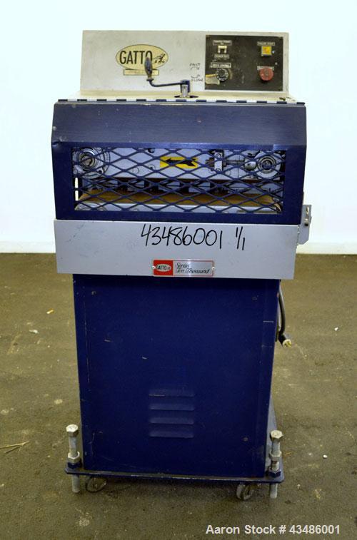 Used Gatto Cat-A-Puller, Model 202-3. (2) 3 Wide x 20 long contact manually adjustable rubber belts. Driven by a 2 hp, 180 volt, 1750 rpm  DC motor thru a reducer. Includes a Baldor DC drive. Mounted...