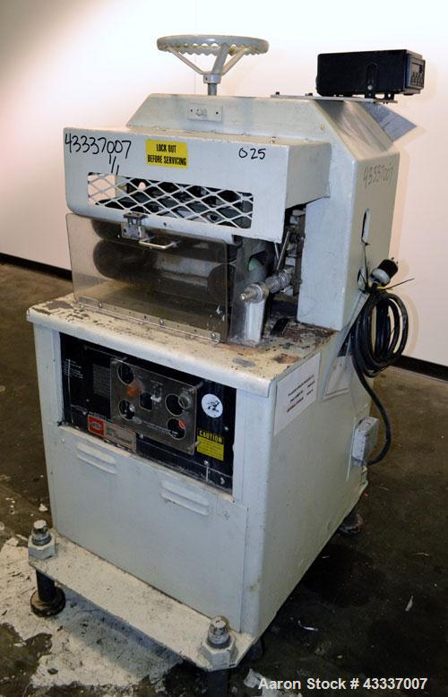 Used Gatto Belt Puller, Model 205-4.(2) 4'' Wide x 16'' long contact lehgth rubber belts, manually adjustable. Base mounted with 4 adjustable legs. 1/60/220 volt.