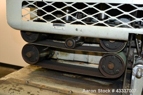 Used Gatto Belt Puller, Model 205-4.(2) 4'' Wide x 16'' long contact lehgth rubber belts, manually adjustable. Base mounted with 4 adjustable legs. 1/60/220 volt.