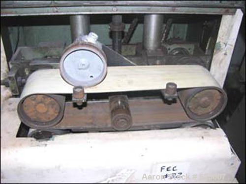 USED: Gatto model 205-4 belt puller. 15" long x 4" wide flat belts, hand operated gap adjustment, with approximate 2 hp, 208 volt motor, with controls and guards.