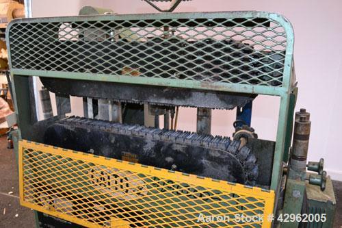 Used Gatto Cat-A-Puller, Model 207-3PC. (2) 3 Wide x 28 long contact cleated rubber belts. Manually adjustable 5 belt opening. Belt speed 1/2-60 feet per minute. Driven by a 3hp, 180 volt DC motor th...