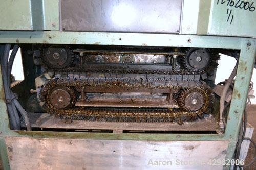 Used Gatto Cat-A-Puller, Model 207-3PC. (2) 3’’ Wide x 28’’ long contact cleated rubber belts. Manually adjustable 5’’ belt opening. Belt speed 1/2-60 feet per minute. Driven by a 3hp, 180 volt DC mo...
