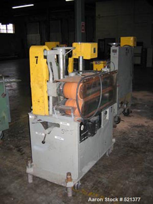 USED: Gatto model MD210-6 puller. 8" x 36" belts, Baldor DC controller, chain drive. Speed range: low/low 0-24 fpm, low/hi 24-84 fpm, hi/hi 84-344 fpm.