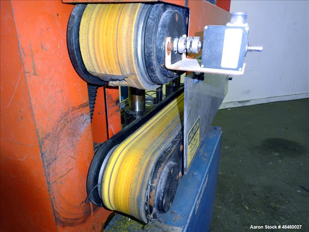 Used Goodman Stand-Alone Puller, Model 4F. (2) 4" Wide x 30" long belts. Driven by a approximate 2hp motor, with gear box, 15 to 1 ratio. Maximum daylight 4". Approximate operating speeds up to 500 f...