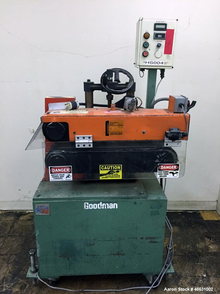 Used Goodman Stand-Alone Puller, Model 6E. Approximately 6" Wide x 24" Long. Manual adjustable raise. Maximum belt opening 6". Driven by a 1hp, 1/60/180 volt, 1750 rpm motor. Mounted on a carbon stee...