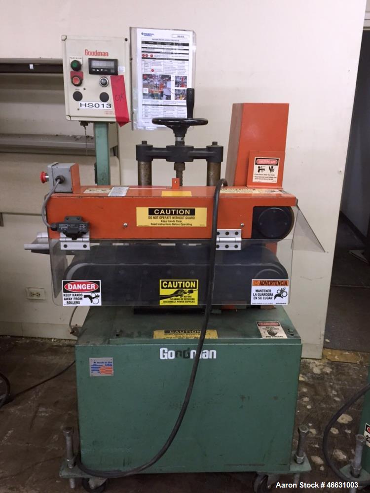 Used Goodman Stand-Alone Puller, Model 6E. Approximately 6" Wide x 24" Long. Manual adjustable raise. Maximum belt opening 6". Driven by a 1hp, 1/60/180 volt, 1750 rpm motor. Mounted on a carbon stee...