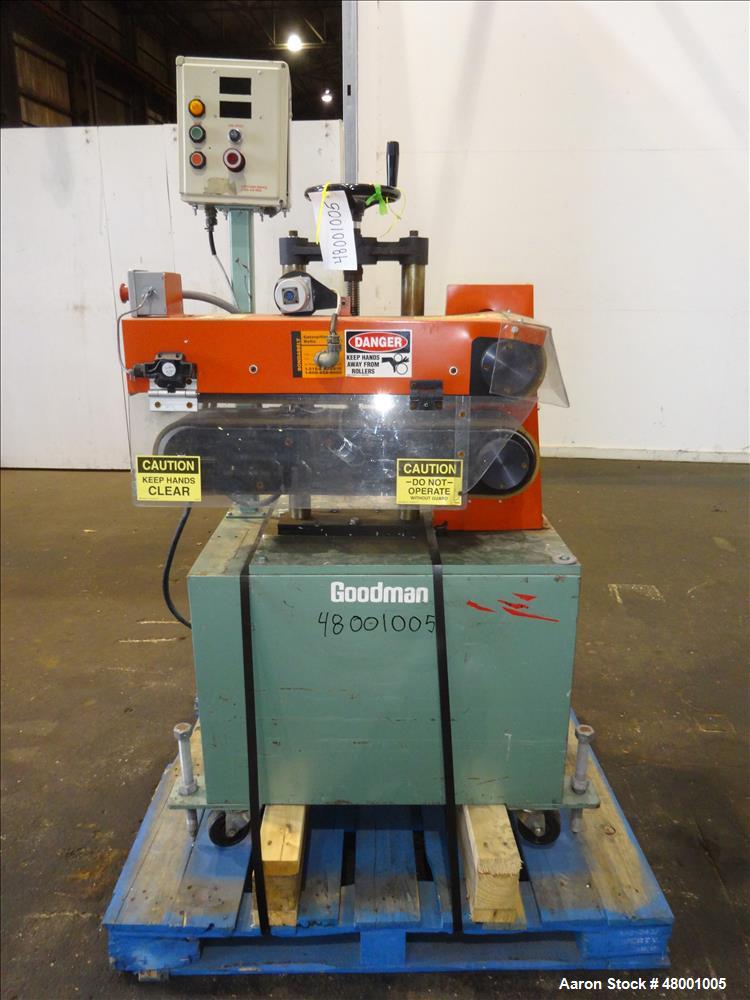 Used Goodman Stand-Alone Puller, Model 6E. Approximately 6" Wide x 24" Long. Manual adjustable raise. Maximum belt opening 6". Driven by a 1hp, 1/60/180 volt, 1750 rpm motor. Mounted on a carbon stee...