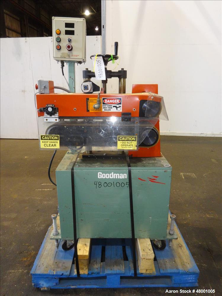 Used- Goodman Stand-Alone Puller, Model 6E. Approximately 6" Wide x 24" Long. Manual adjustable raise. Maximum belt opening ...