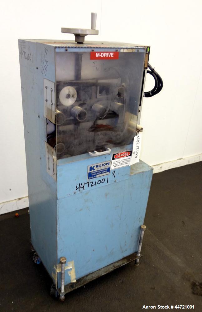 Used Killion Puller, Model 2-12, Carbon Steel.  Approximateky 2" wide x 12" long contact area rubber belts, manually adjustable, approximately 2-1/2" maximum daylight.  Driven by a 1 hp, 180 volt, 17...