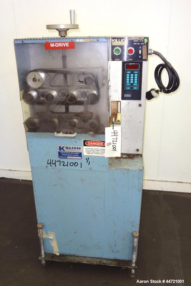 Used Killion Puller, Model 2-12, Carbon Steel.  Approximateky 2" wide x 12" long contact area rubber belts, manually adjustable, approximately 2-1/2" maximum daylight.  Driven by a 1 hp, 180 volt, 17...