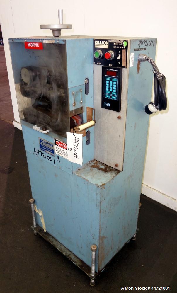 Used Killion Puller, Model 2-12, Carbon Steel.  Approximateky 2" wide x 12" long contact area rubber belts, manually adjustable, approximately 2-1/2" maximum daylight.  Driven by a 1 hp, 180 volt, 17...